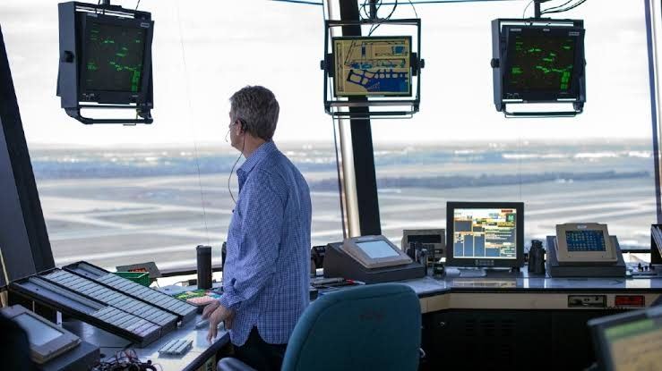 Air traffic controller at a radar position